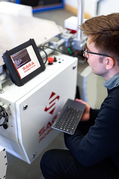 Technician working on a robotic arm. 